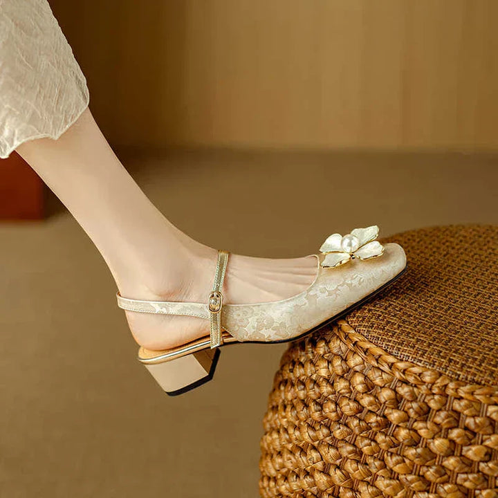 Slingback Pumps by Genine