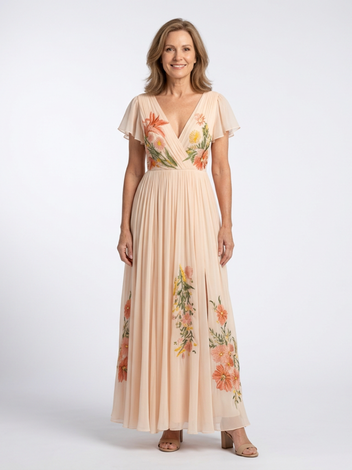 Calista | Robe maxi plissée à fleurs avec col en V et manches courtes